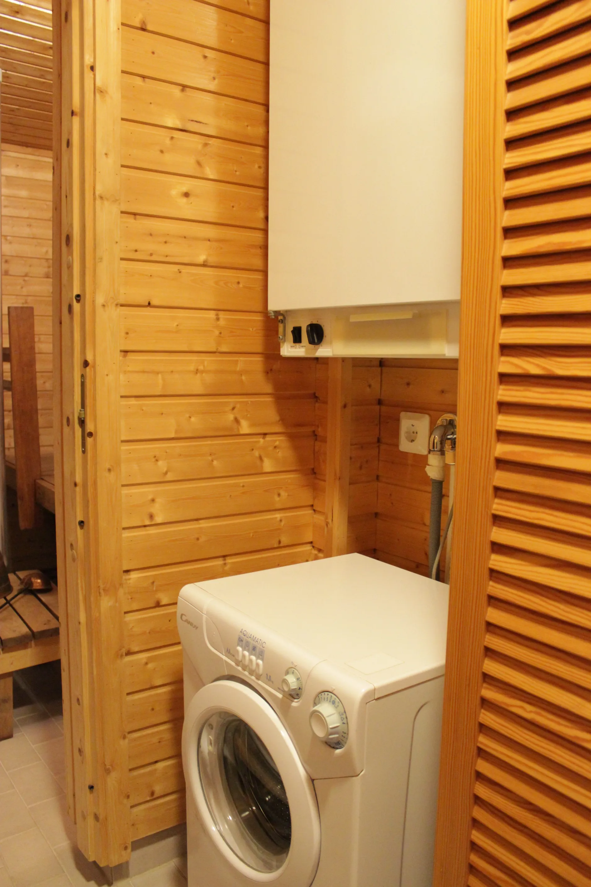 Rantamökki 28 pesukone